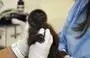 
Veterinarians Carolina Saenz and Estefania Rubio treat a six-month-old silvery woolly monkey (Lagothrix poeppigii), a species in danger of extinction, at the Tueri Wildlife Hospital in Quito, after it was seized by the Environment Ministry and taken to this centre for evaluation. [Galo Paguay / AFP]        