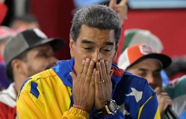 
El candidato presidencial venezolano Nicolás Maduro reacciona a los resultados electorales en Caracas, el 29 de julio. [Yuri Cortez/AFP]        