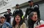 
En marzo de 2012, un grupo de mujeres protestó frente a la embajada de China en Quito, gritando consignas contra la firma de un contrato entre el gobierno ecuatoriano y una empresa china para la extracción de cobre en la selva amazónica. [Rodrigo Buendía/AFP]        